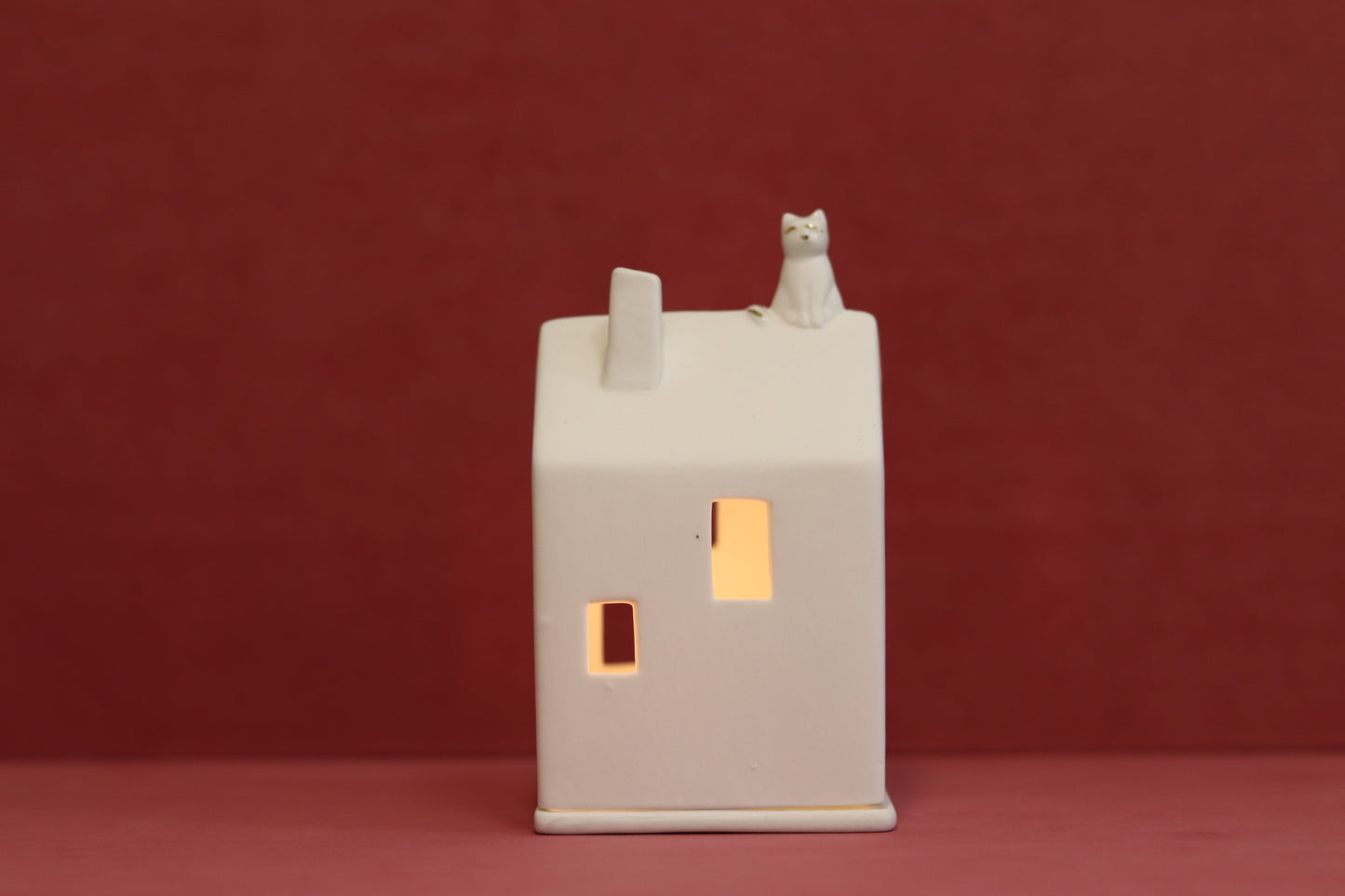 Casa de luz Gato